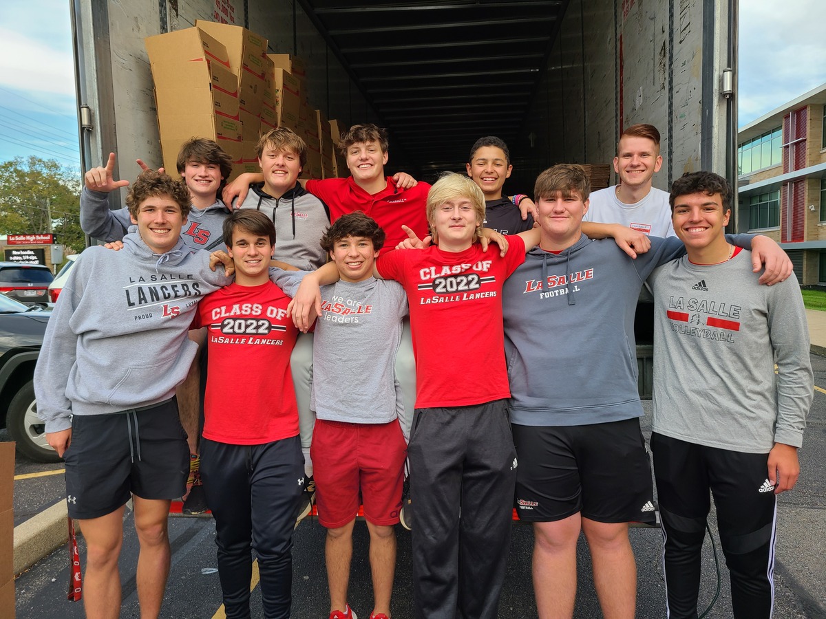 Students in front of truck